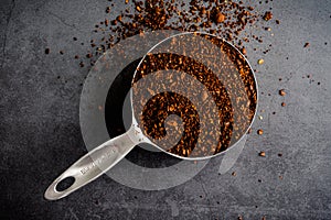 Coarsely Ground Coffee in a Measuring Cup