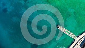 Coast as a background from top view. Turquoise water background from top view. Summer seascape from air.