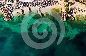 Coast as a background from top view. Turquoise water background from top view. Summer seascape from air.