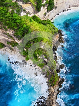 Coast as a background from top view. Turquoise water background from top view. Summer seascape from air. Bali island, Indonesia.