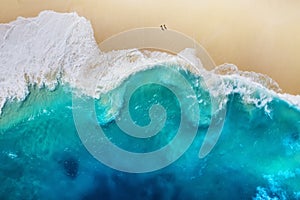 Coast as a background from top view. Turquoise water background from top view. Summer seascape from air. Nusa Penida island, Indon photo