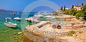 Coast and beach of Prvic island panoramic summer view