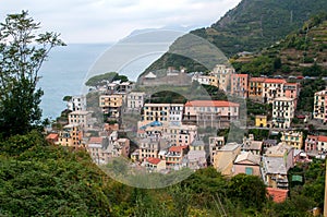 Coast with colorful houses in Corniglia on a rock above the sea Italy, Cinque Terre