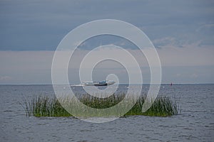 The coast of the Gulf of Finland, Peterhof, St. Petersburg. Summer day, contrasting lighting, pre-storm blue thick textured sky. T