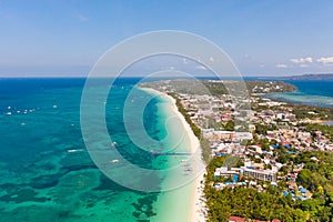 The coast of the island of Boracay. White beach and clear sea. Seascape with a beautiful coast in sunny weather.