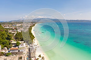 The coast of the island of Boracay. White beach and clear sea. Seascape with a beautiful coast in sunny weather.