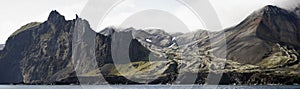 Coast of Jan Mayen island from the sea photo