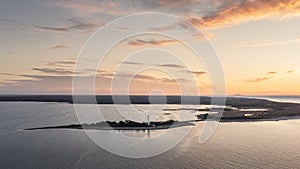 Coast and lighthouse Lange Erik in the north of the island of Öland in the east of Sweden from above during sunset