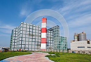 Coast line with a incinerator for municipal waste photo