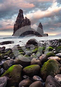 Coast in Madeira -  Ilheu da Ribeira da Janela rock formation in the ocean, Portugal photo