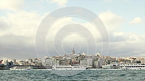 The coast of the old city of Istanbul. Galata Tower and Galata Bridge in one frame