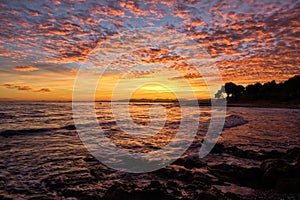 The coast of Oropesa del Mar at a sunrise photo