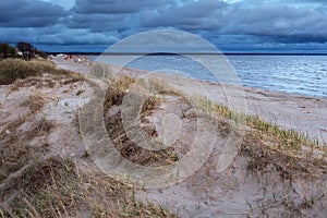 Coast of the Parnu Bay in evening in overcast