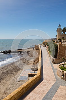 Coast path and Roquetas del Mar lighthouse Costa de AlmerÃÂ­a, Spain photo