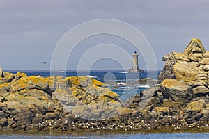 Coast with Phare du Four near Argenton in Brittany, France