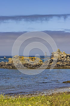 Coast with Phare du Four near Argenton in Brittany, France