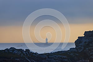 Coast with Phare du Four near Argenton in Brittany, France