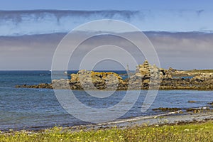 Coast with Phare du Four near Argenton in Brittany, France