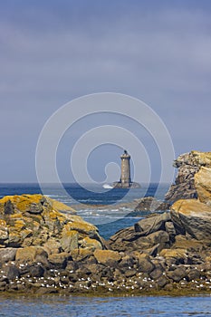 Coast with Phare du Four near Argenton in Brittany, France