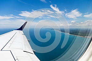 Coast through plane window