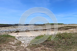 Coast in Plouguerneau and lighthouse of Wrac`h island