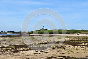 Coast in Plouguerneau and lighthouse of Wrac`h island