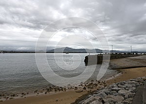 Coast of Santander, at low tide with breakwater