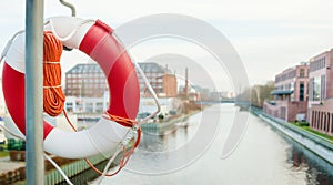 Coast security. Lifebuoy on the city embankment. For news of banner.