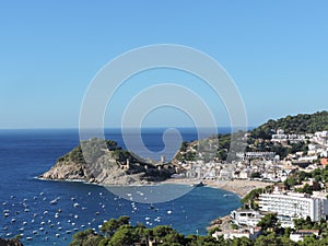 Coast view of the cliffs and beach in Costa Brava photo