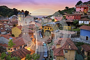 Coast village at Sunset in Asturias, Spain photo