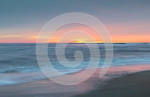 Coastal Background Sea, Sand, and Sunrise Sky in Outer Banks NC