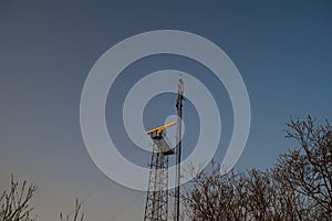 Coastal beach radar pillar during a sunset in European country Latvia