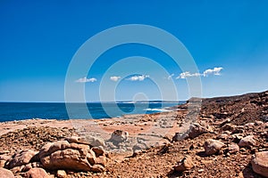 Coastal cliff landscape with boulders in Kalbarri National Park, Western Australia