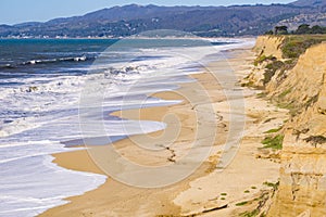 The coastal cliffs and beach of Half Moon Bay, California