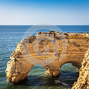 Coastal cliffs and beaches along the Percurso dos Sete Vales trail, Algarve, Portugal photo