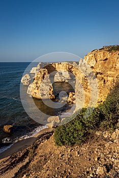 Coastal cliffs and beaches along the Percurso dos Sete Vales trail, Algarve, Portugal photo