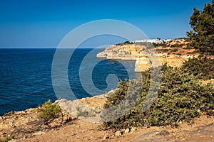 Coastal cliffs and beaches along the Percurso dos Sete Vales trail, Algarve, Portugal photo