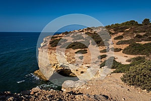 Coastal cliffs and beaches along the Percurso dos Sete Vales trail, Portugal photo