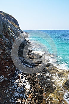 Coastal cliffs and blue waters