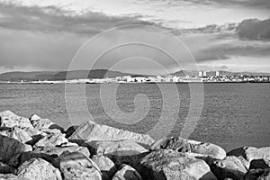 Coastal defence and fortification. Stony breakwater in sea. Breakwater surround docks, ports and lagoons. Breakwater
