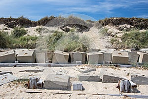 Coastal erosion management with concrete blocks. Sea defenses in