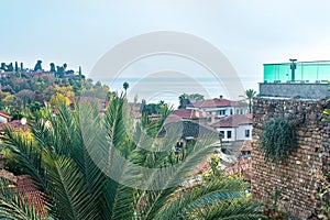 Coastal landscape with ancient coastal Mediterranean city, KaleiÃ§i, historic center of Antalya, Turkey