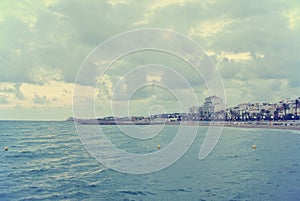 Coastal landscape on a cloudy windy afternoon; retro Instagram style