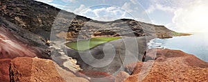 Coastal landscape with Lago Verde and black sands at El Golfo beach, Lanzarote, Canary Islands, Spain