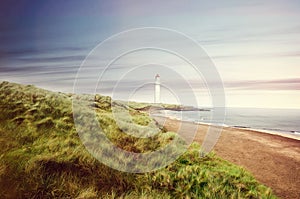 Coastal landscape with lighthouse