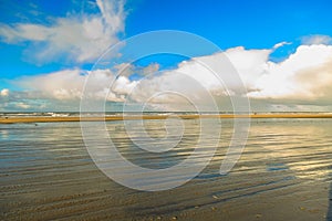 Coastal landscape at low tide and sunrise