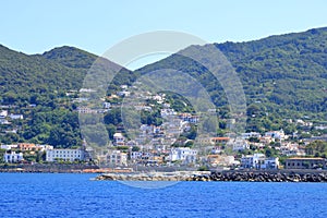 Coastal landscape with marina of Casamicciola Terme, Ischia Island, Italy photo