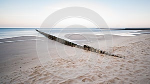 Coastal protection with groynes at the sea