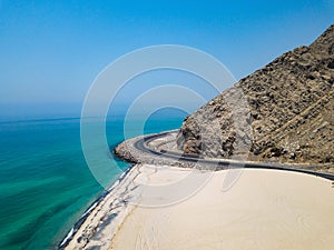 Coastal road and seaside in Musandam Governorate of Oman aerial photo