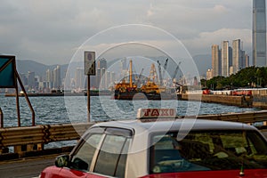 Coastal road and vehicles in Kennedy Town, Hong Kong